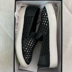 Steve Madden black keats sneakers.